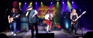 AZ/DZ tribute band rocking the stage with high-voltage energy and signature AC/DC style